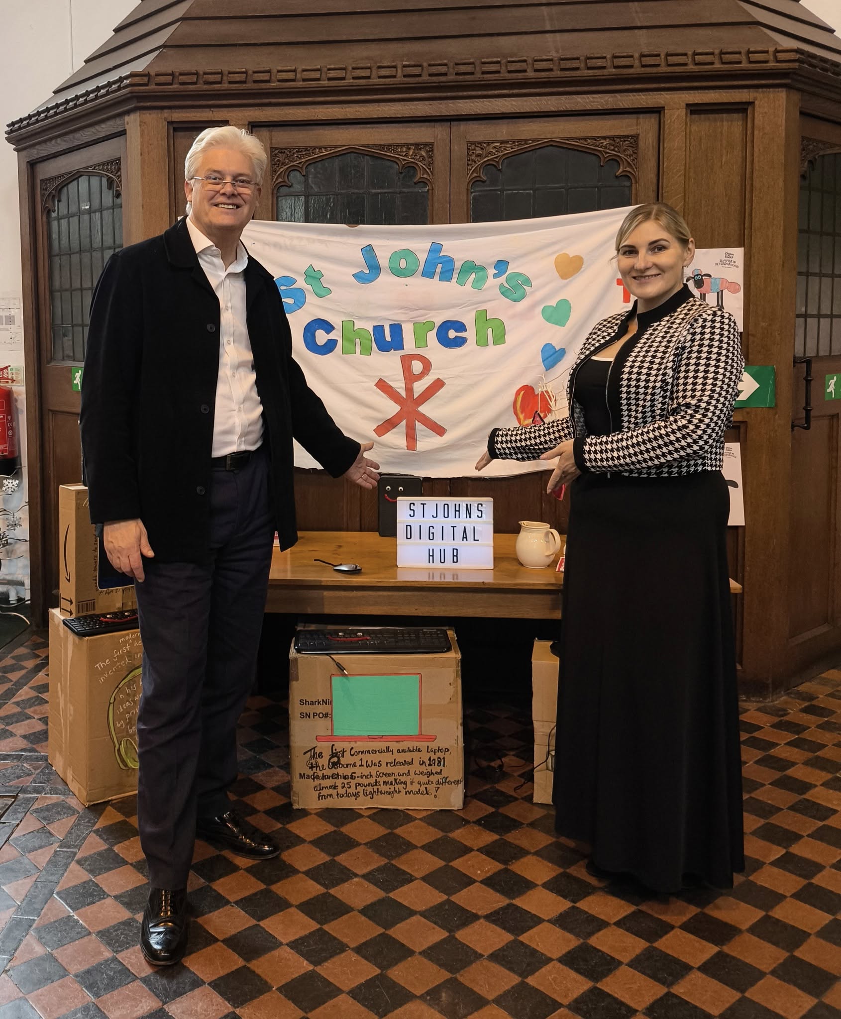 Marcus and Snow promoting one of the first support venues in Peterborough, St John's Church, delivered by some of our first Trainees